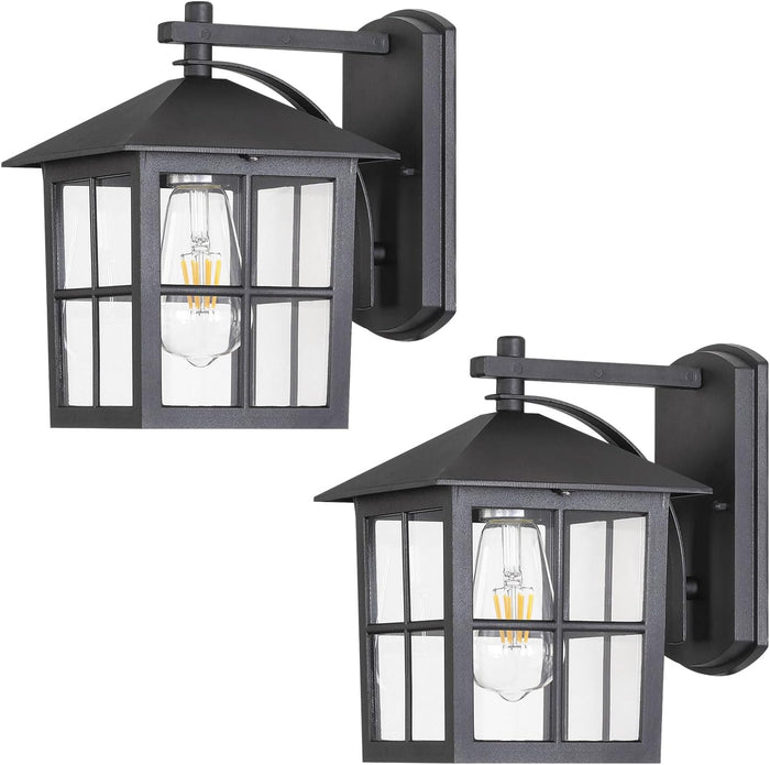 Two black outdoor wall lights with clear glass panels on a white background