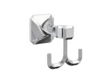 A polished chrome robe hook with a geometric profile and twist details from the Napier Collection.